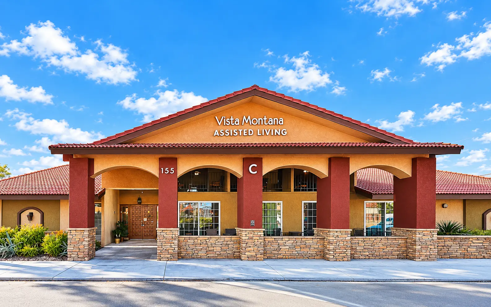Vista Montana main entrance with red columns and tile roof